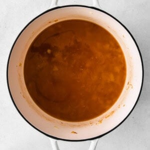 Deglazed broth and wine in a Dutch Oven.