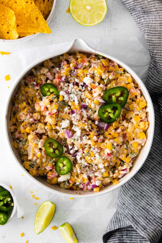 mexican corn salad topped with fresh jalapeno
