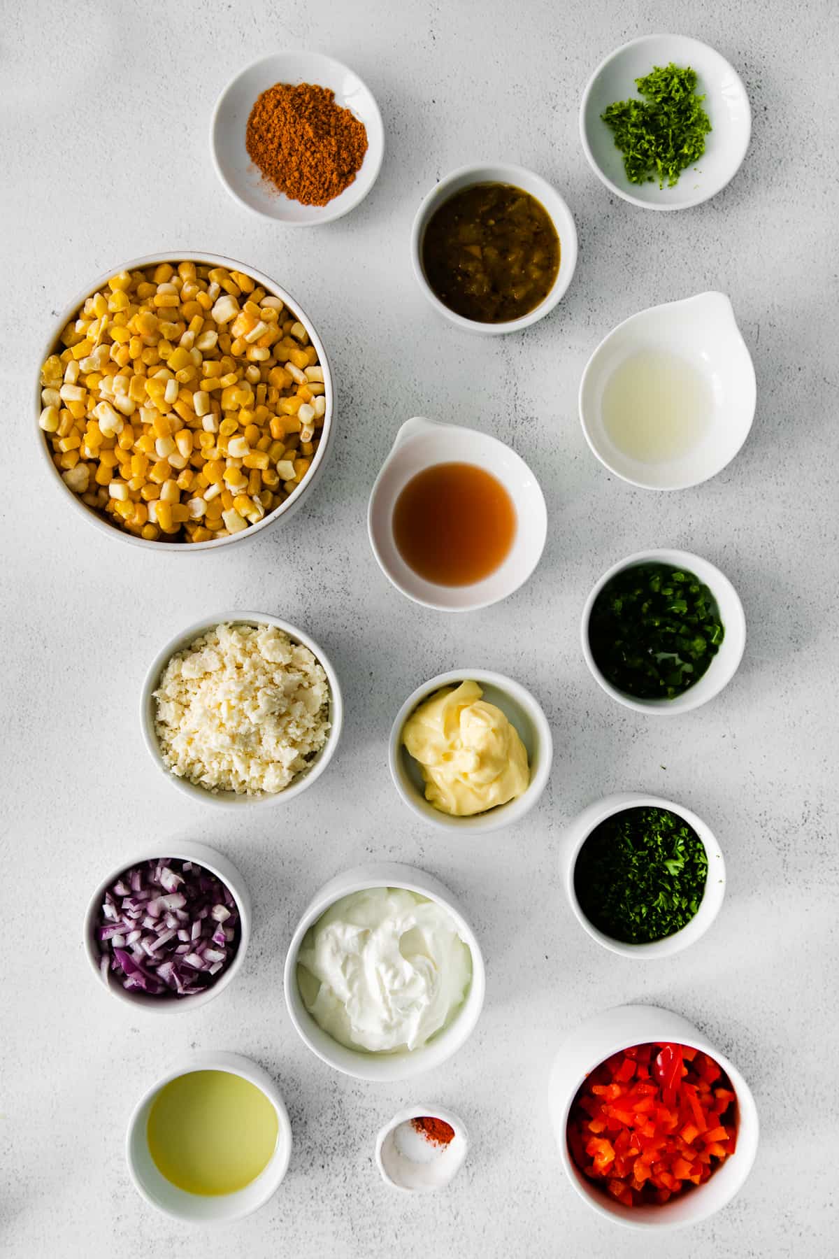 ingredients for mexican corn salad in bowls.