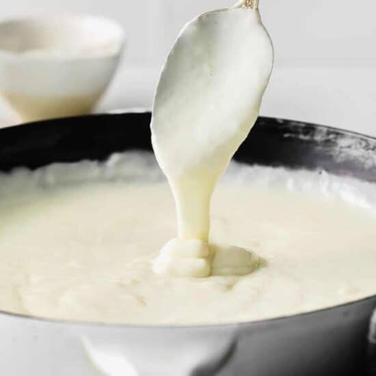 a spoon of bechamel sauce