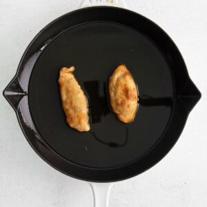 pan frying empanadas.