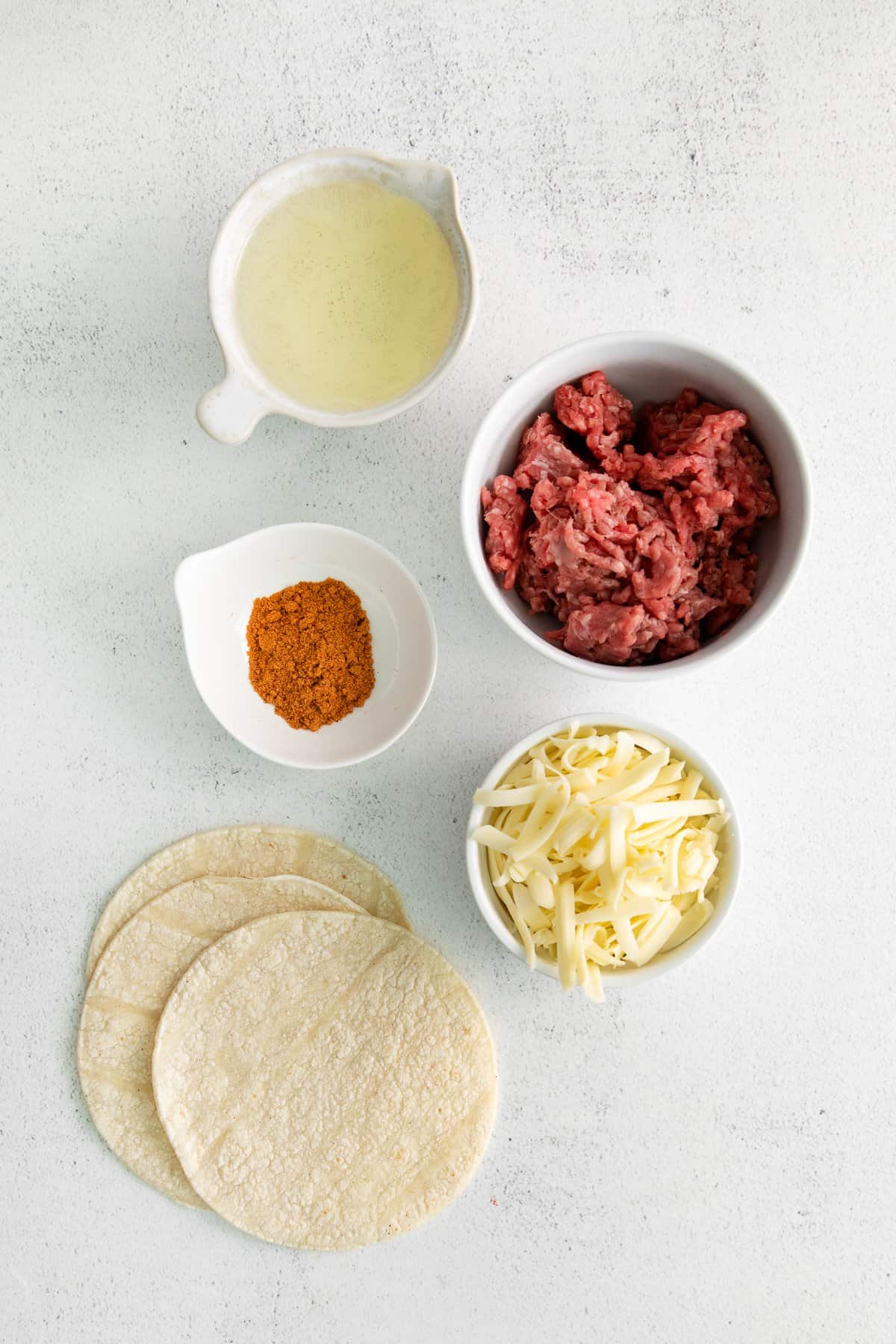 Ingredients for cheese and beef taquitos.