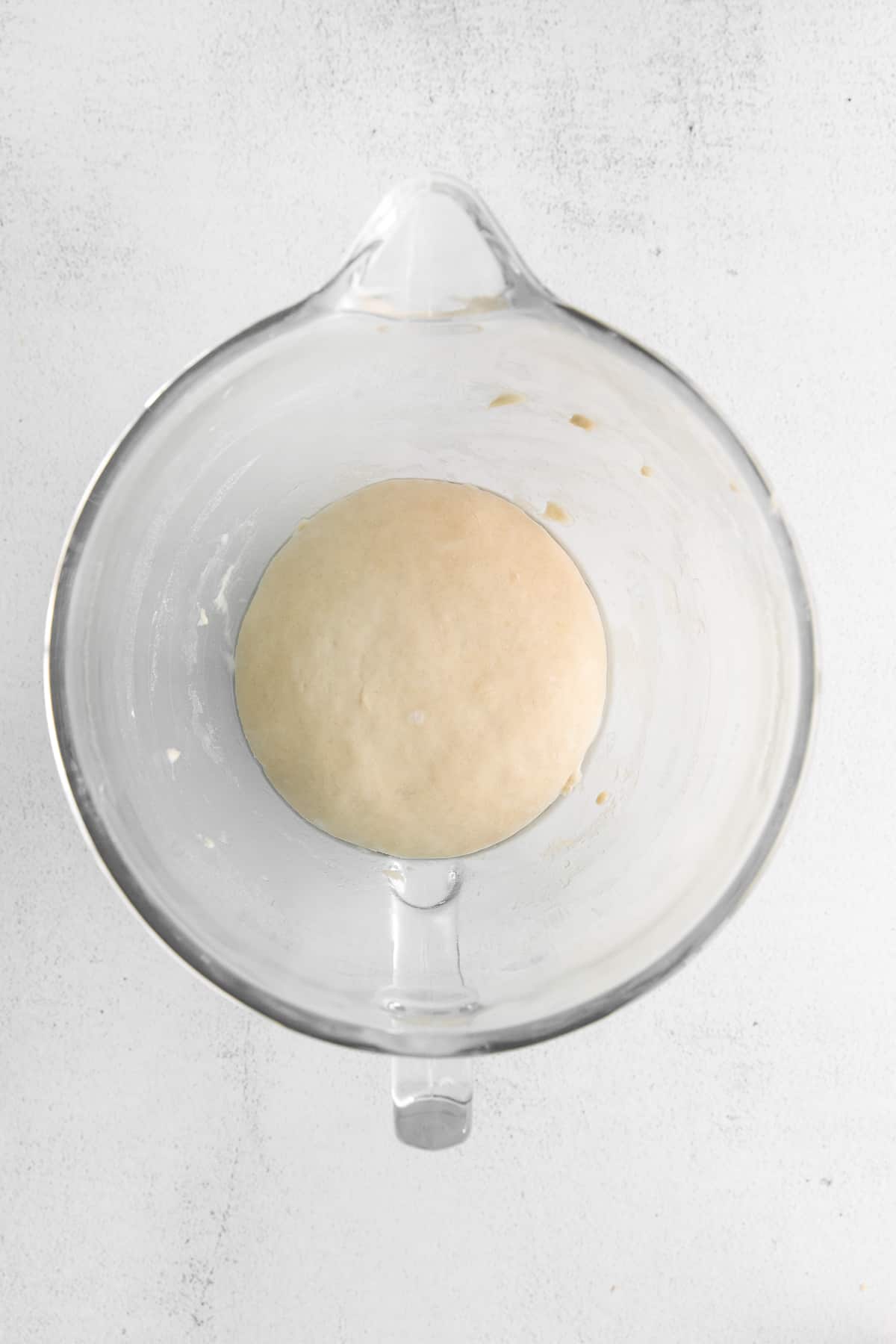 Cheese bread dough in a bowl.