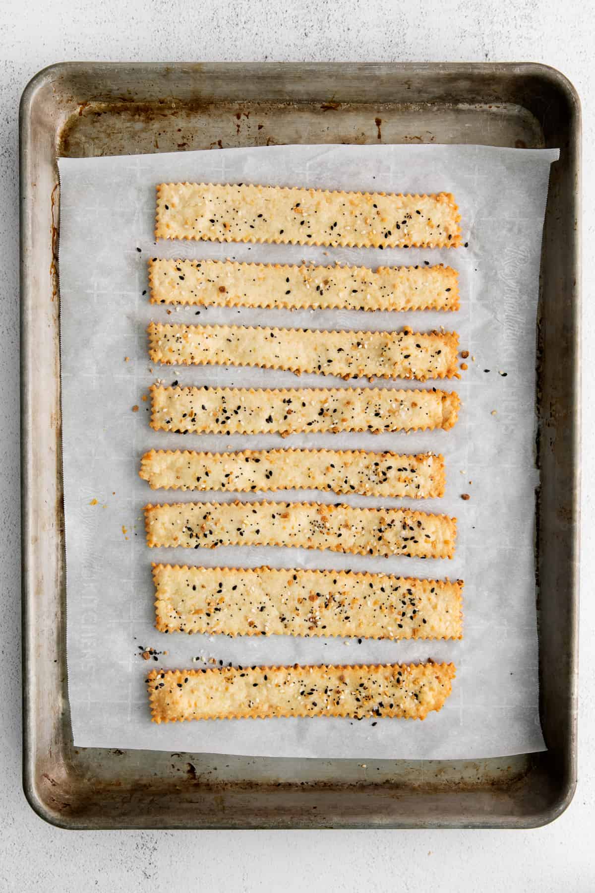 cheese crackers on baking sheet.