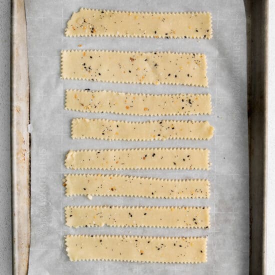 crackers cut on baking sheet.