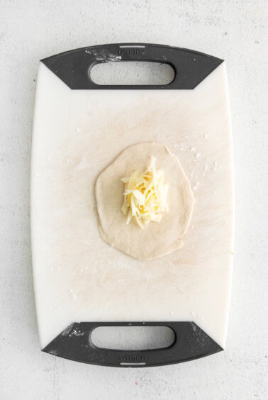 cheese in the center of empanada.