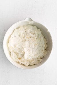 Cheese tortellini filling in a bowl.