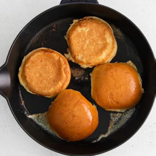 pancakes in a skillet on a white background.
