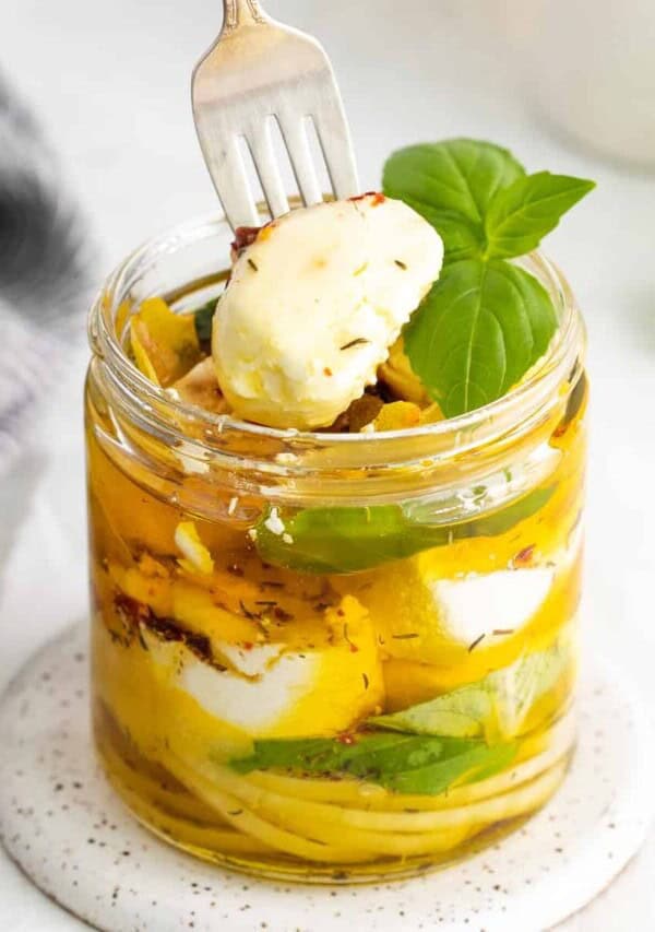 a fork with Marinated Goat Cheese