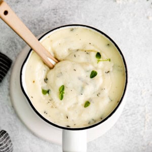 Parmesan garlic sauce in a small pot.