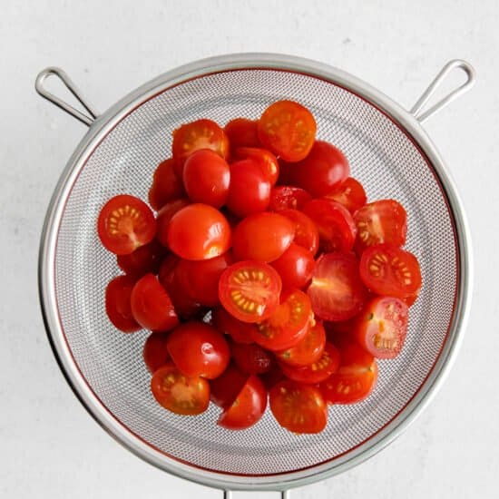 tomatoes in strainer.