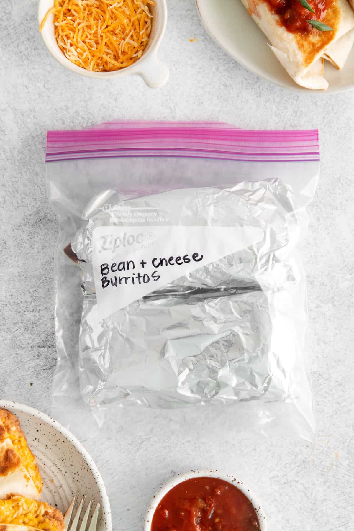Bean and cheese burritos in a ziploc bag for the freezer.