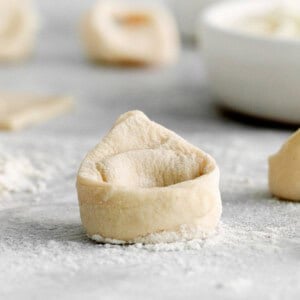 tortellini on cutting board.