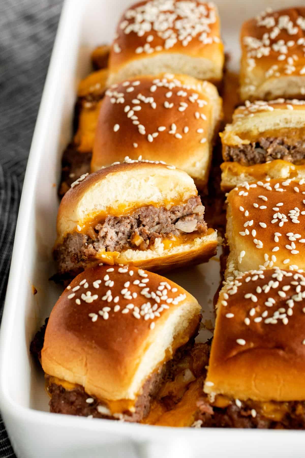 cheeseburger sliders in casserole dish.