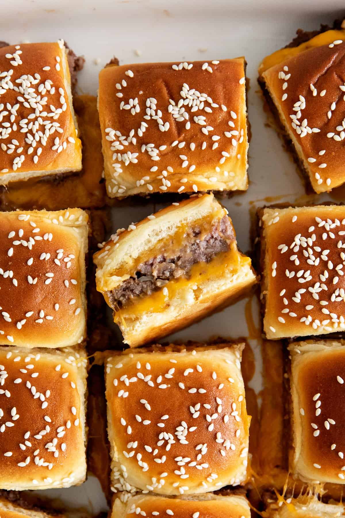 cheeseburger sliders in casserole dish.