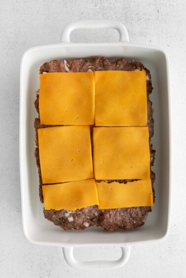 meat and cheese in dish.