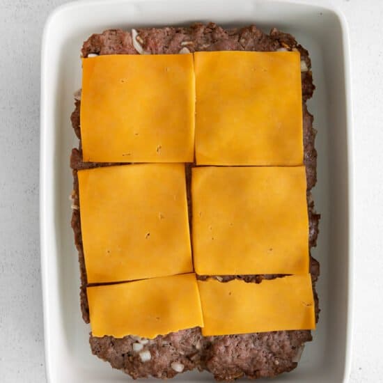 meat and cheese in dish.