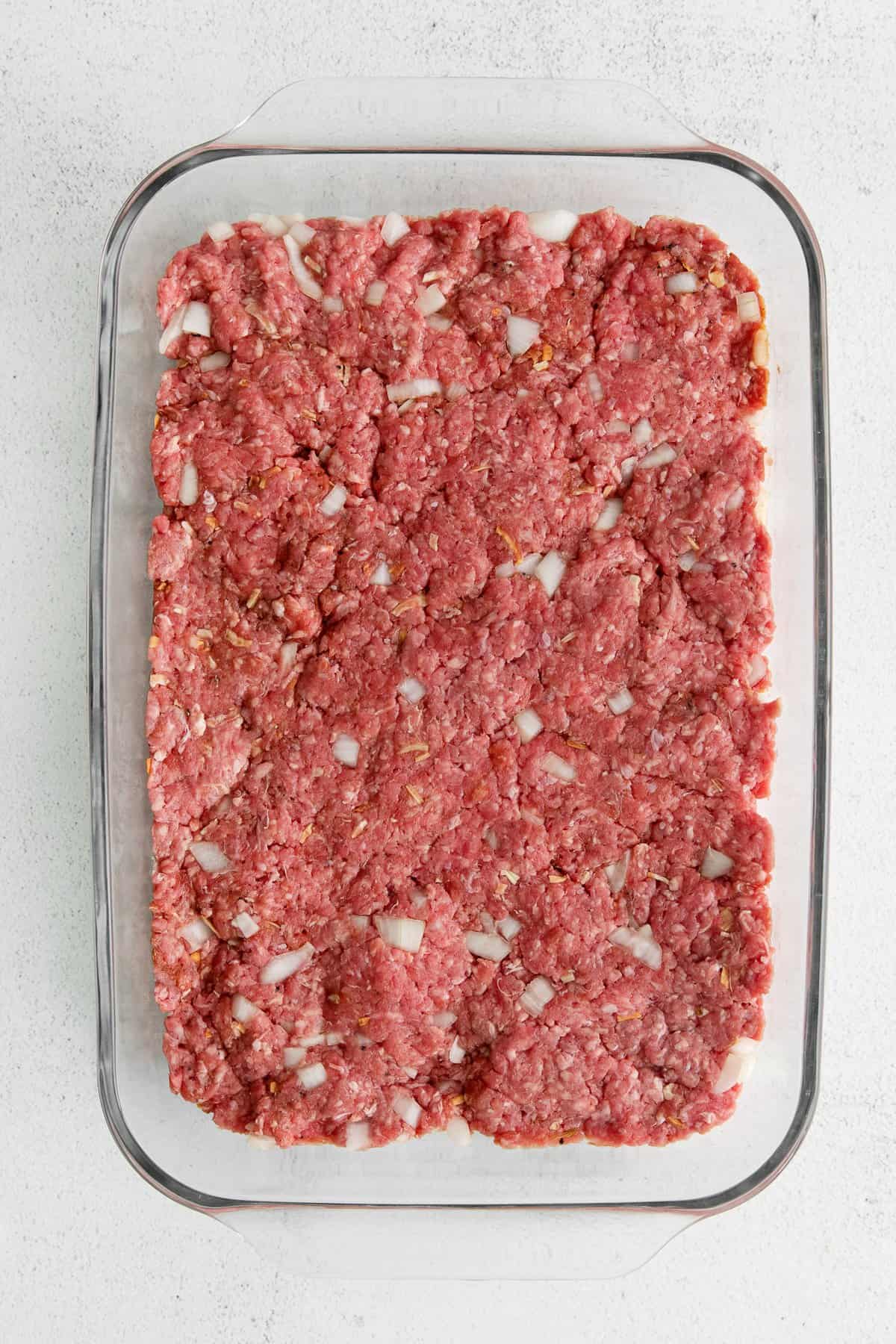 giant hamburger patty in casserole dish.