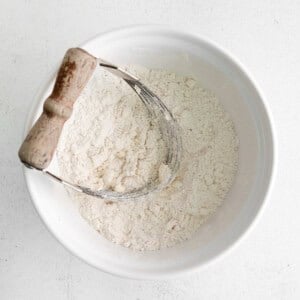 cutting butter into dough.