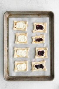 cream cheese danish on baking sheet.