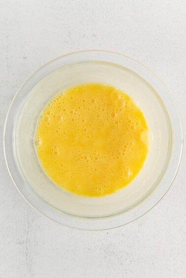 Whisked Eggs in a bowl.