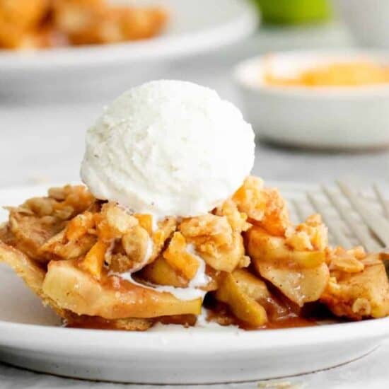 apple pie with cheese topped with ice cream