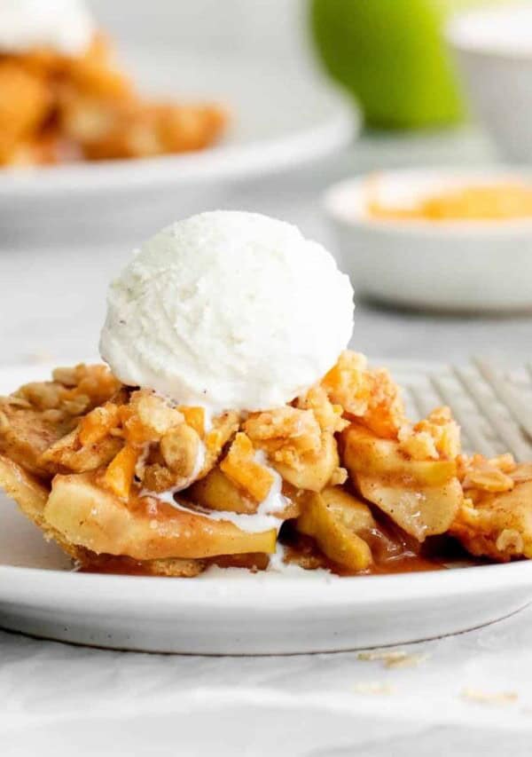 apple pie with cheese topped with ice cream
