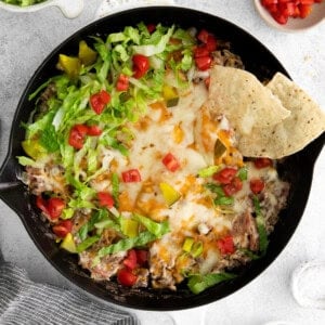 Cheeseburger dip in a skillet.