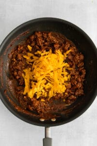 cheese and beef in skillet.