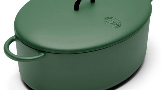 A green oval casserole with handles, perfect for Tuscan chicken mac and cheese.