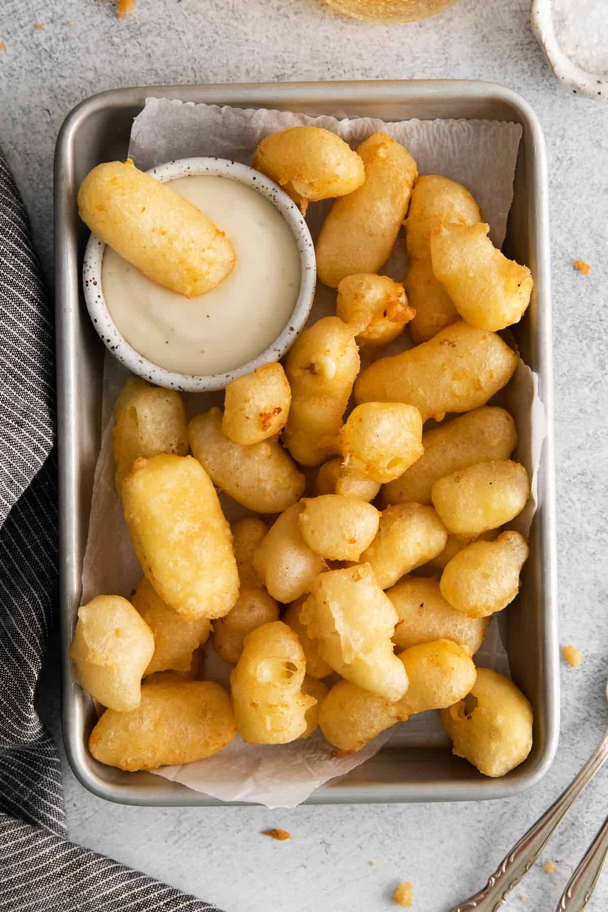 cheese curds on platter.