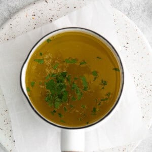 Garlic butter sauce with fresh parsley.