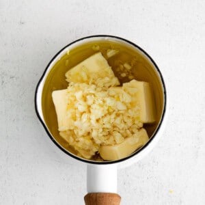 Garlic, butter, and olive oil in a small saucepan.