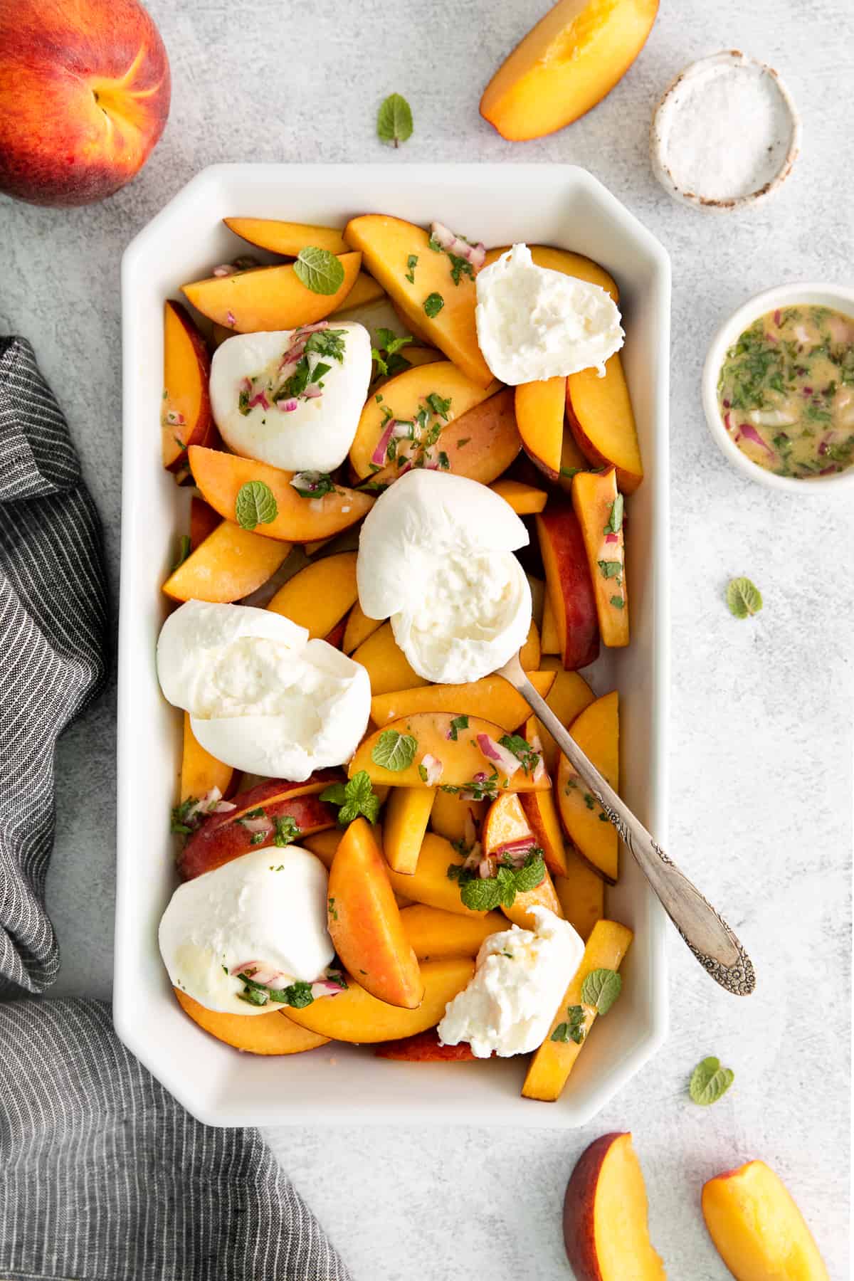 peaches in platter with burrata cheese. 