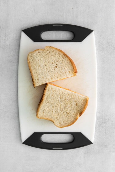 Pimento cheese sandwich cut in half.