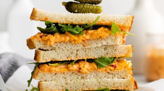 A stack of pimento cheese sandwiches.