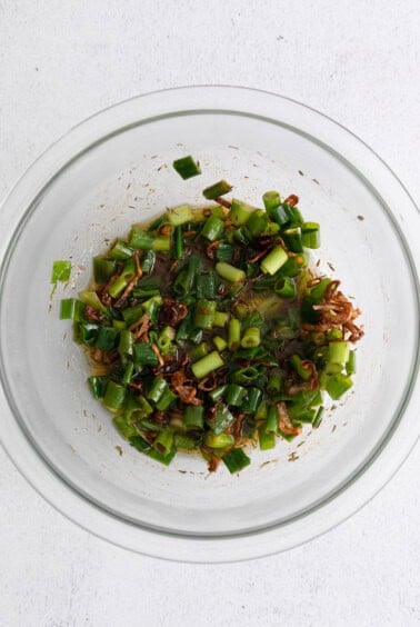green onions in bowl.