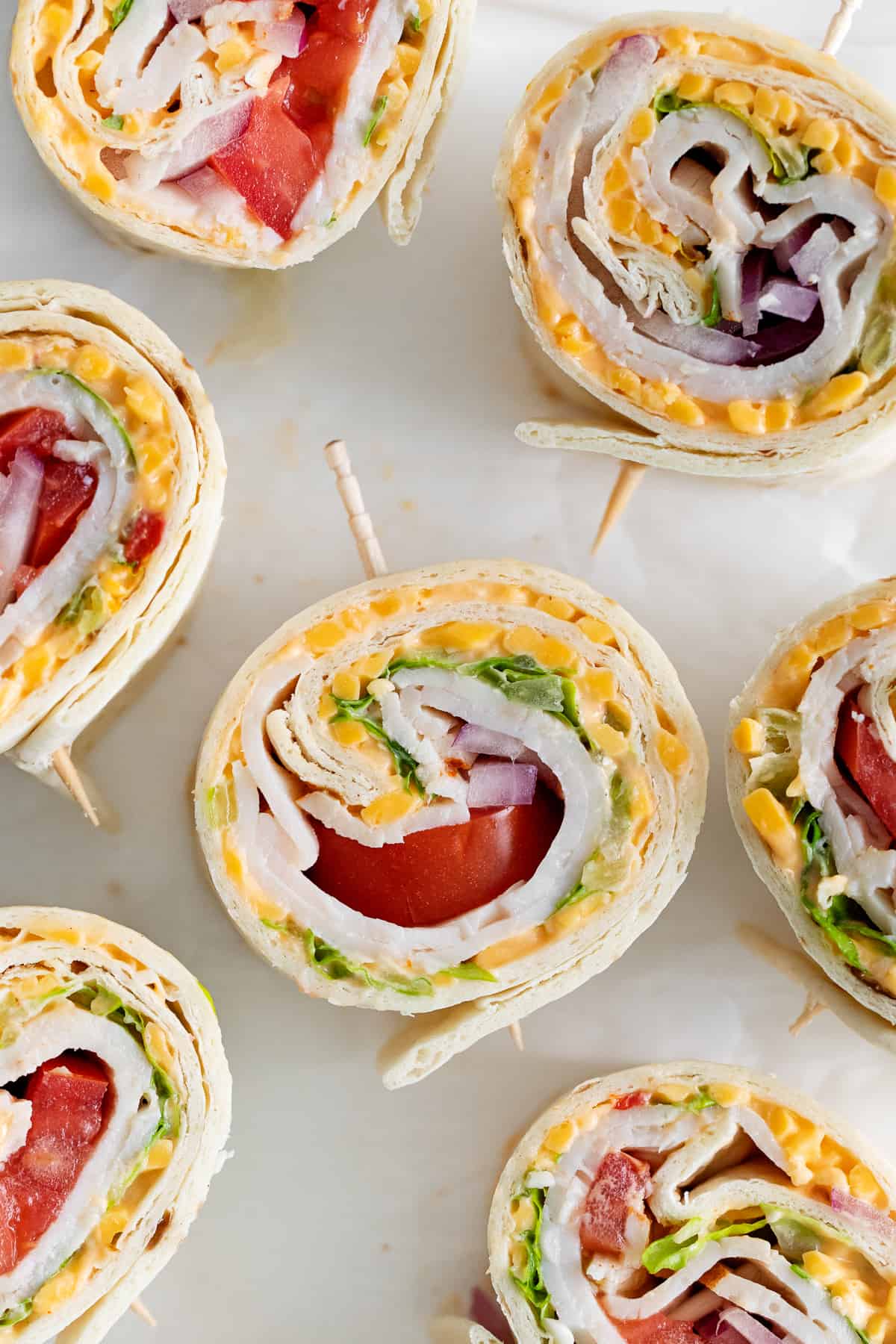 Sliced pimento cheese wheels. 