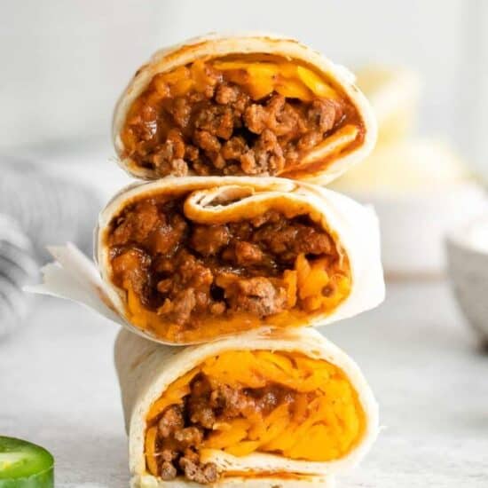 stack of 3 burritos cut in half.