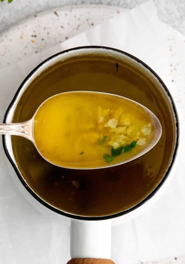 a spoon of Easy Garlic Butter Sauce