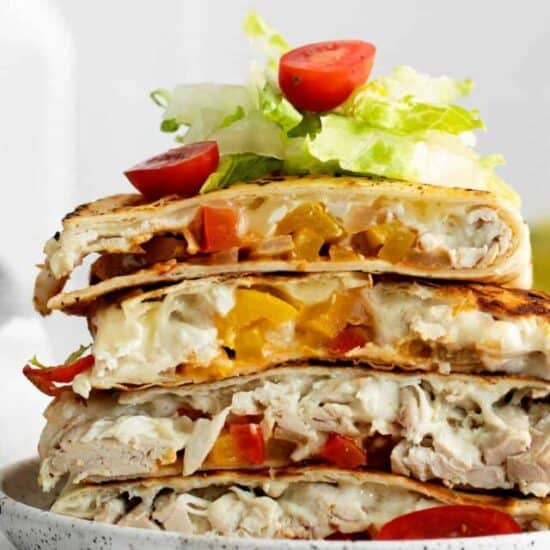 a stack of chicken quesadillas