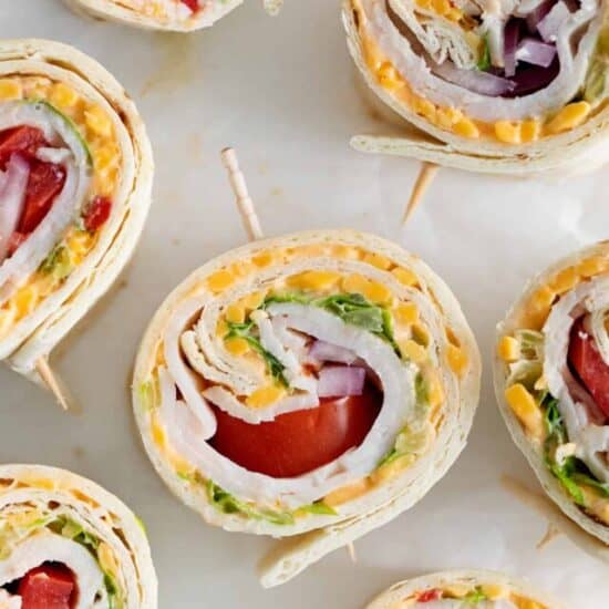 Pimento cheese pinwheels with turkey and fresh veggies.