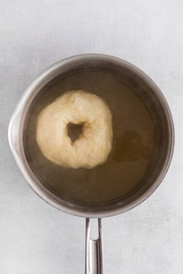 boiling bagel in water.