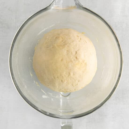 dough rising in bowl.