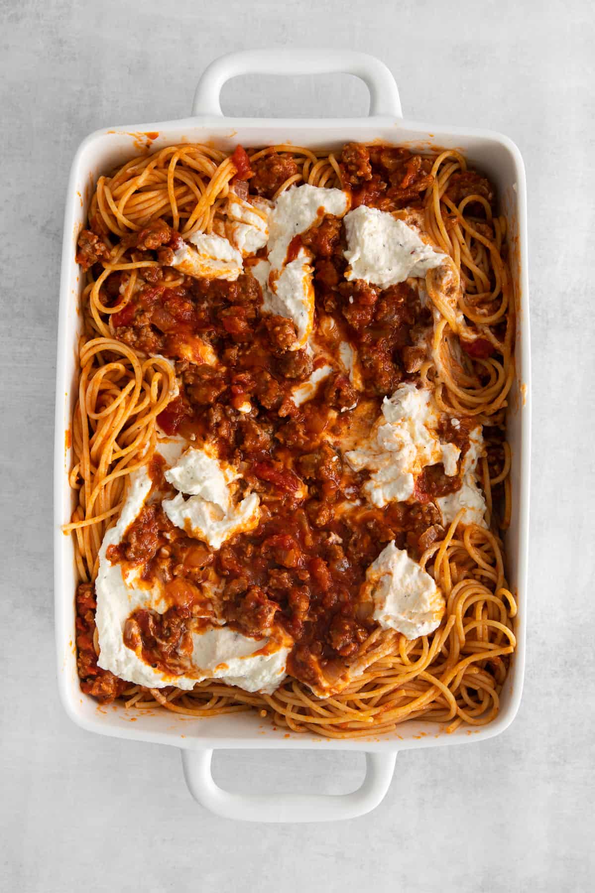 baked spaghetti in casserole dish.