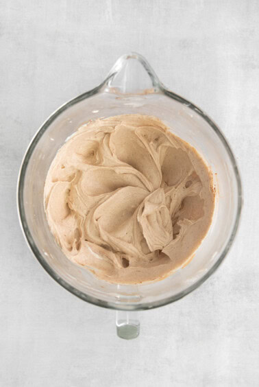 a blender with a mixture in it on a table.