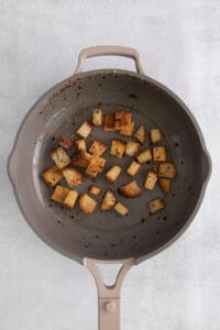 a frying pan with a piece of bread in it.