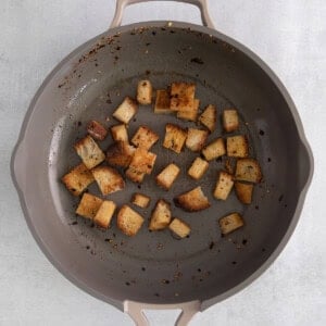 a frying pan with a piece of bread in it.