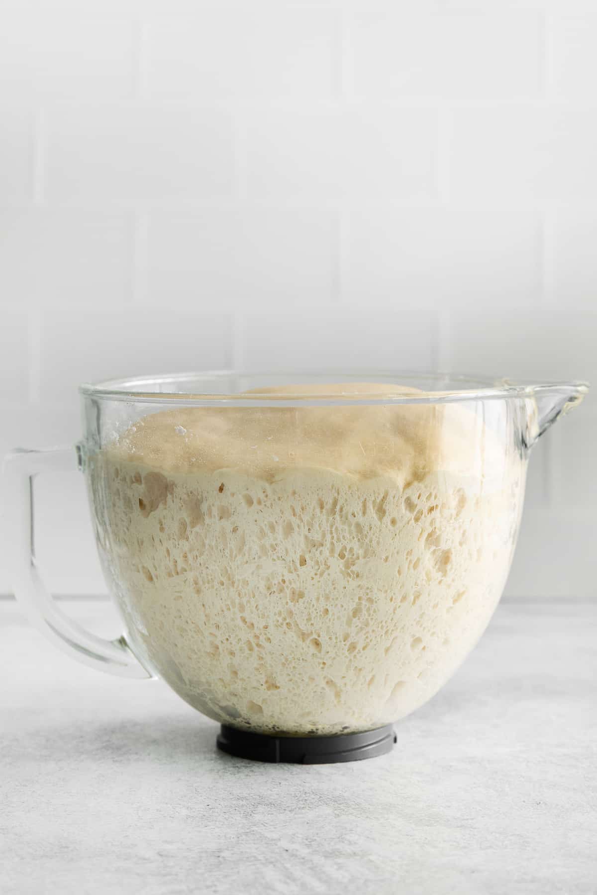 The dough doubled in size in a bowl.