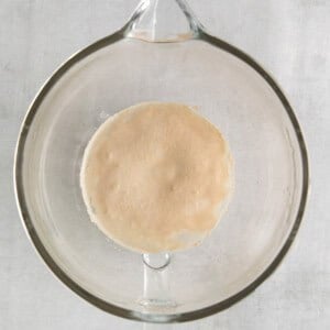 Activating the yeast in a bowl.